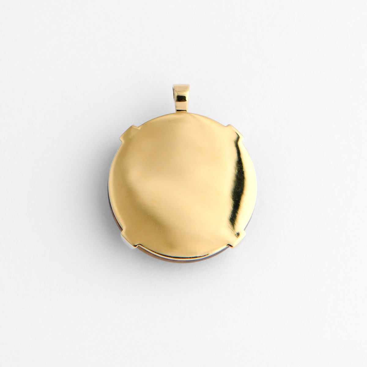 Back of Spar in warm, golden-yellow brass, showing its smooth, plain reverse for personalised engraving.