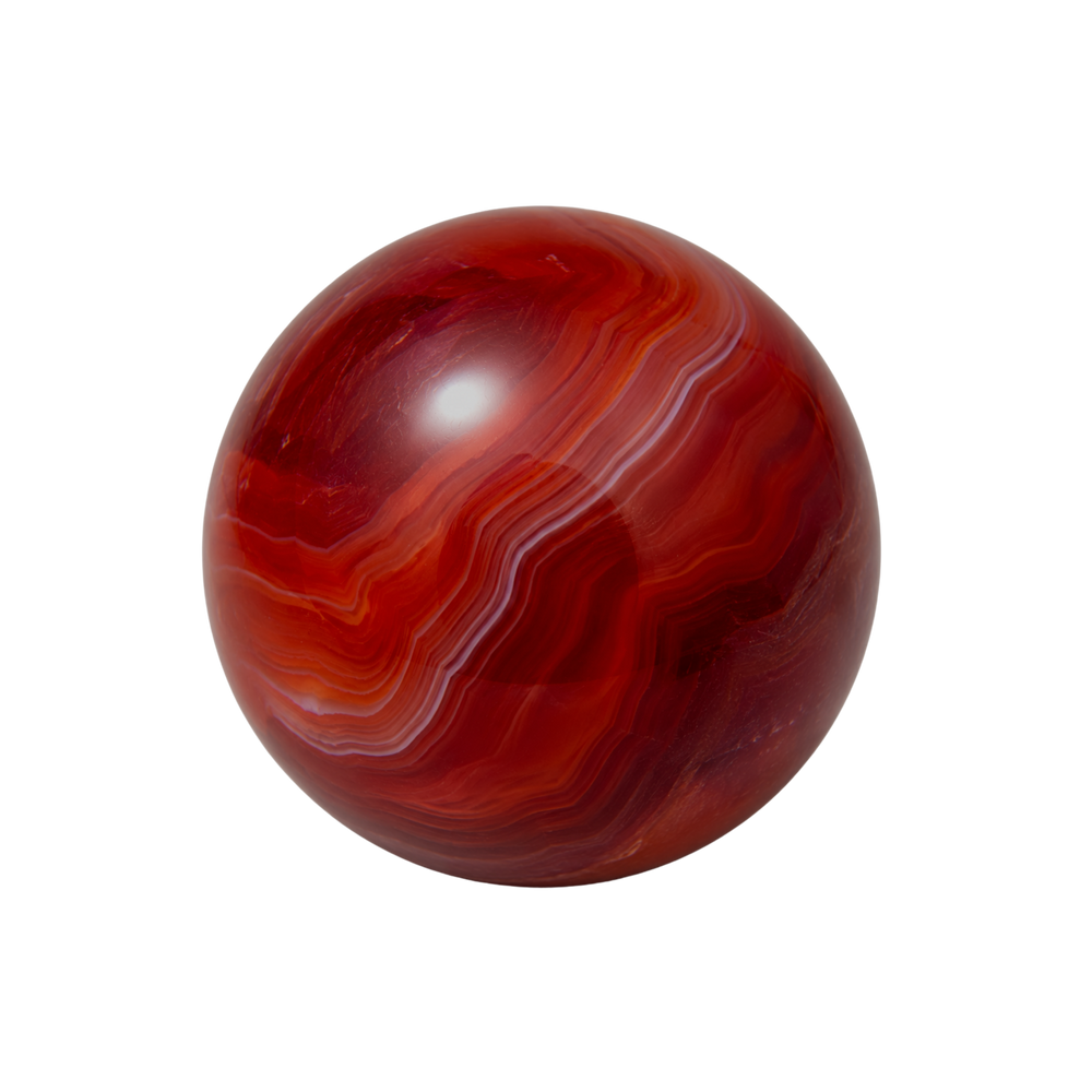 A polished orb of sard, deep translucent reddish-brown, glowing warmer and more fiery where the light passes through it.